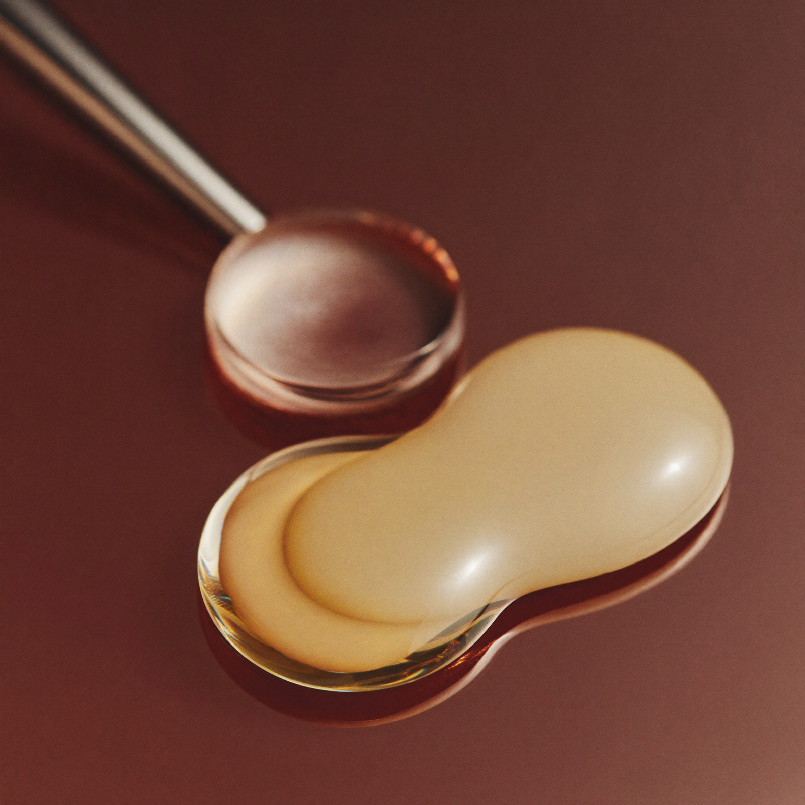 Close-up detail of a clear skincare serum